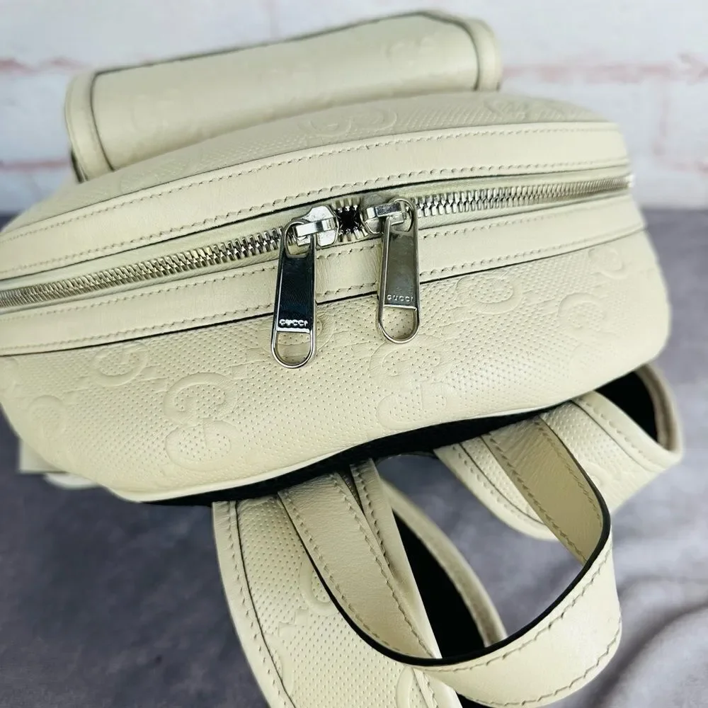 Gucci Embossed Leather Print Gg Backpack